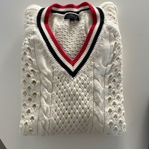 Topshop- V neck cable knit sweater. Cream with black and red trim at V neck.